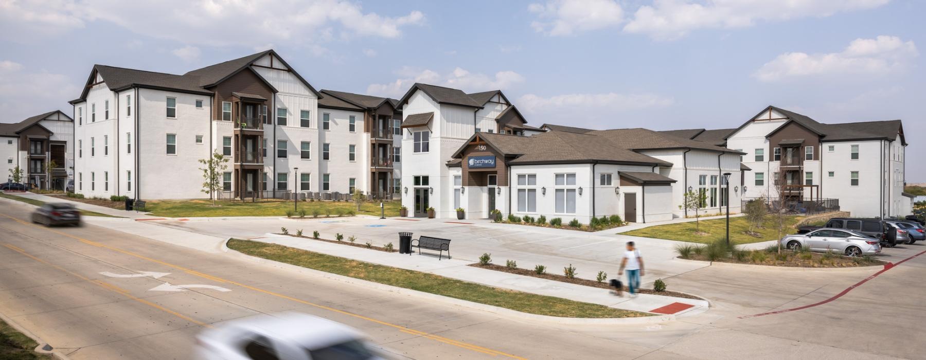 an apartment building near a street