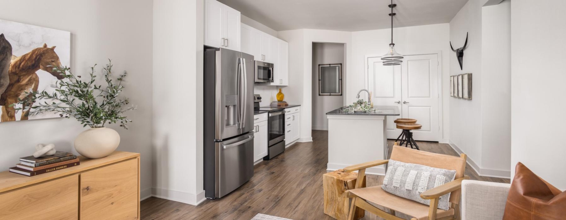 Open space living area with wood-style flooring